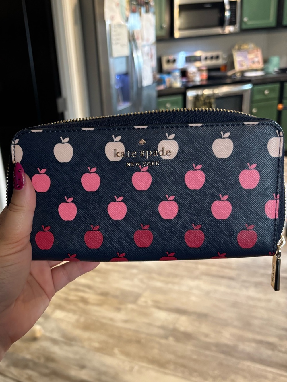 kate spade navy wallet with pink and cream apple print